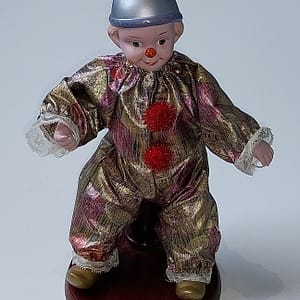 Porseleinen Muziekclown/ Muziekpop, opwindbaar