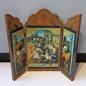 Prachtig houten drieluik die de "Aanbidding der Koningen"